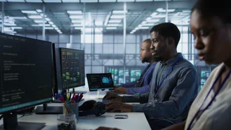 diverse team of tech professionals working in a data center