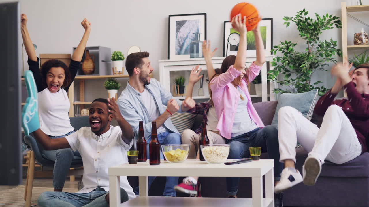 Friends Watching a Basketball Game