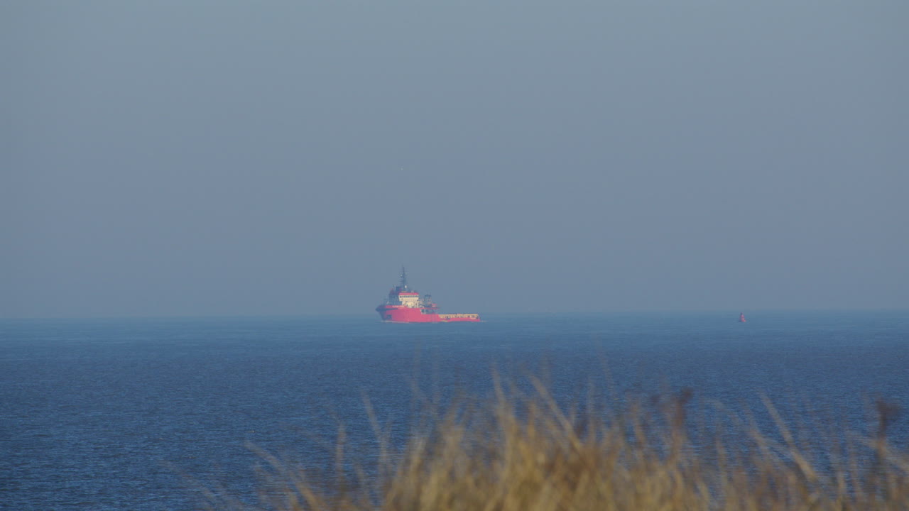Long shot of a offshore supply ship called jaguar pride