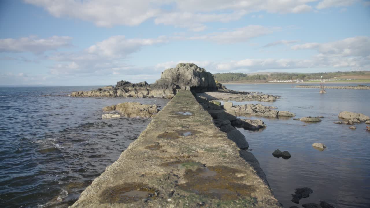 Flat concrete jetty surface, picturesque view, Ayrshire coastline, UK