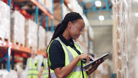 warehouse worker scanning inventory with tablet and barcode scanner
