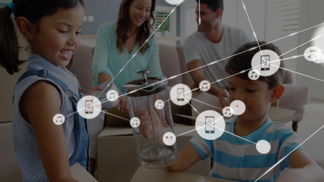 연결된 장치 및 미디어 아이콘의 네트워크 - 가족이 상자를 분해하는 동안 애니메이션