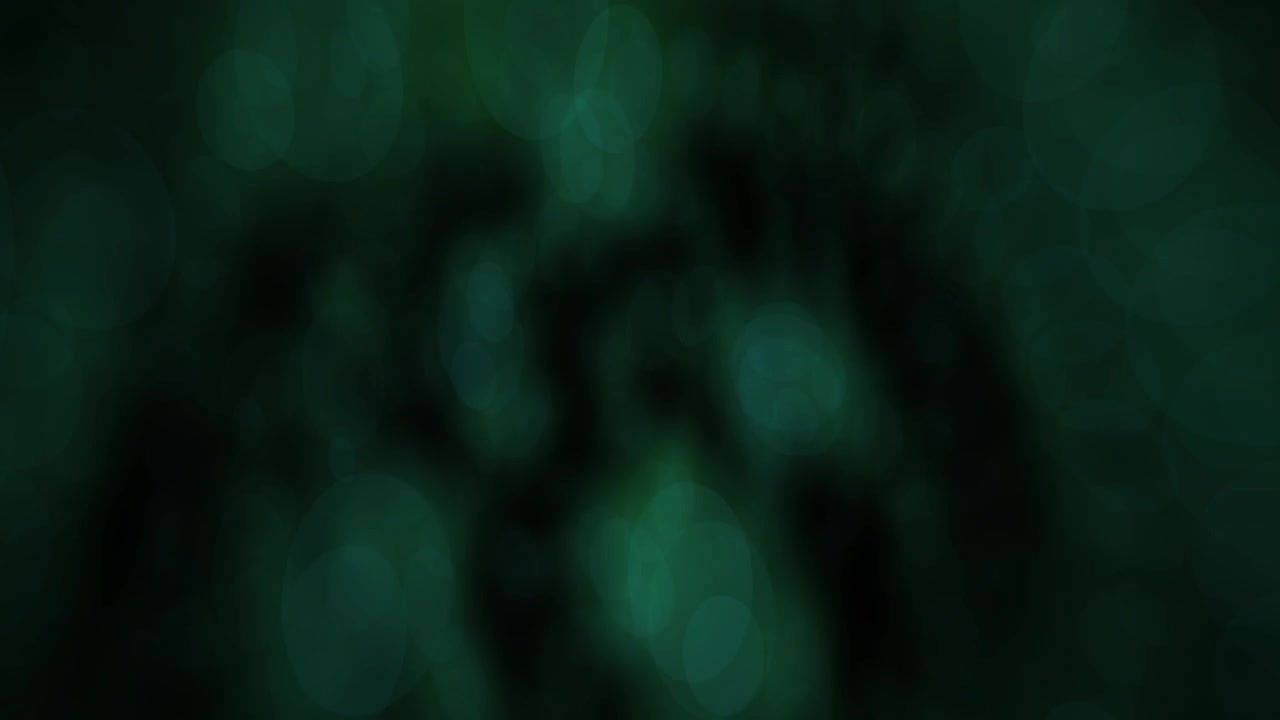 Abstracte Groene Bokeh Lichtdeeltjes Zwevend op een Donkere Achtergrond