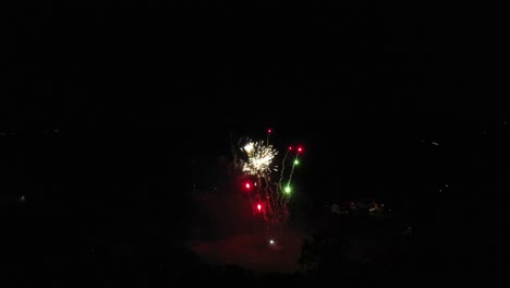 Fireworks-of-different-colors-being-launched-in-the-dead-of-night