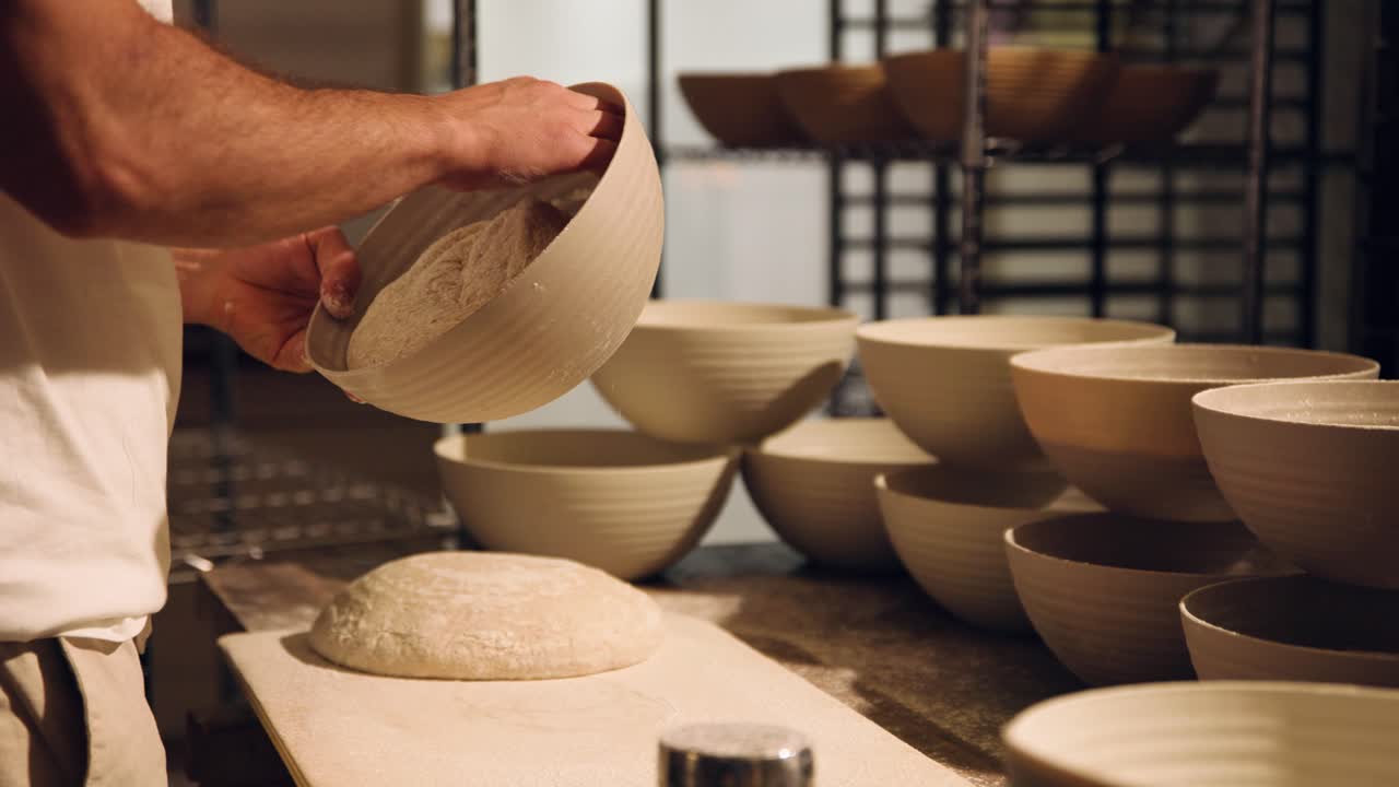 Baker's Hands Preparing Fresh Bread Dough in a Kitchen
