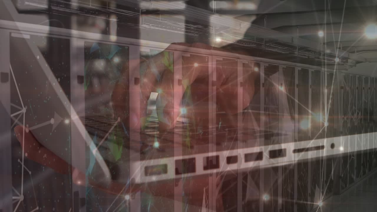 Animation of network of connections over man typing on computer keyboard and computer servers