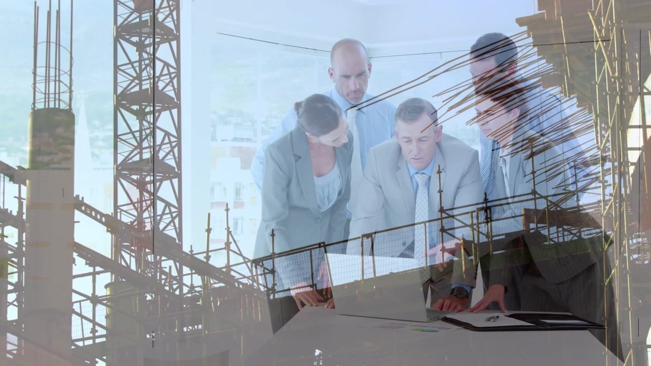 Animation of a construction site over a group of caucasian engineers