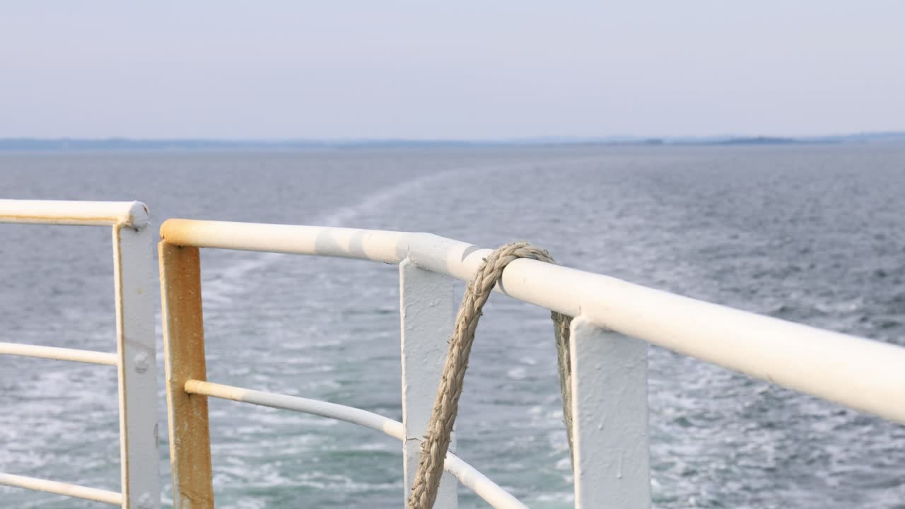 Rope on the ship crossing the ocean, boat wake