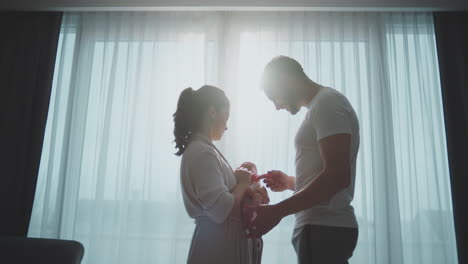 Parents Caring for Newborn Baby