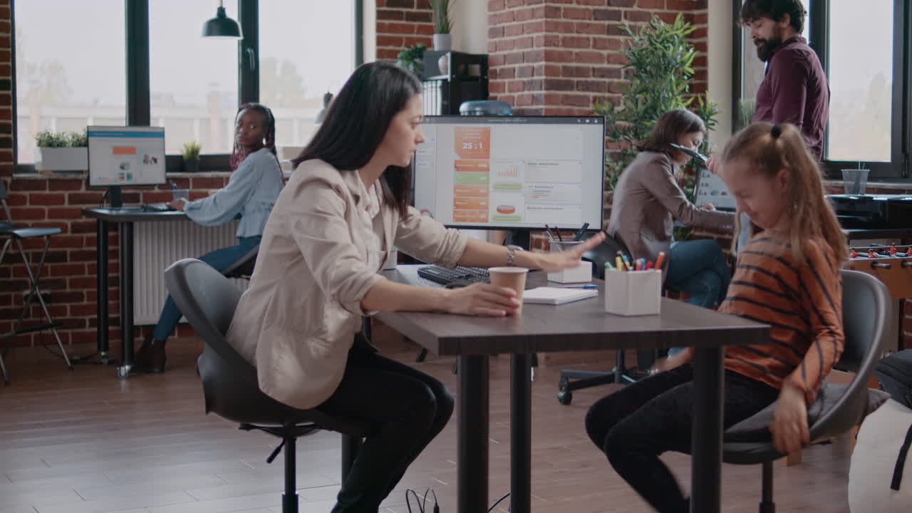 Single mom at work trying to calm loud daughter disturbing colleagues