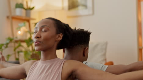 Yoga,-breathing-and-couple-meditate-on-living-room