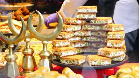 turkish delight and baklava on display in a bakery