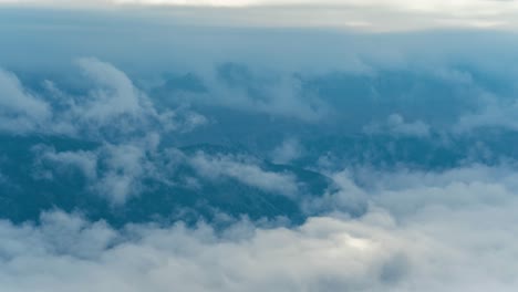 Timelapse,-Clouds-and-Fog-Above-Mountain-Valley-and-Peaks,-Lookout-POV