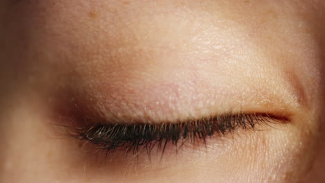 closeup of a human light green eye