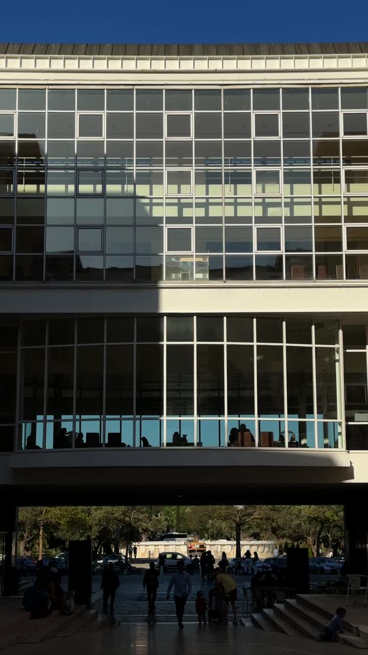 Modern Building with People in Courtyard