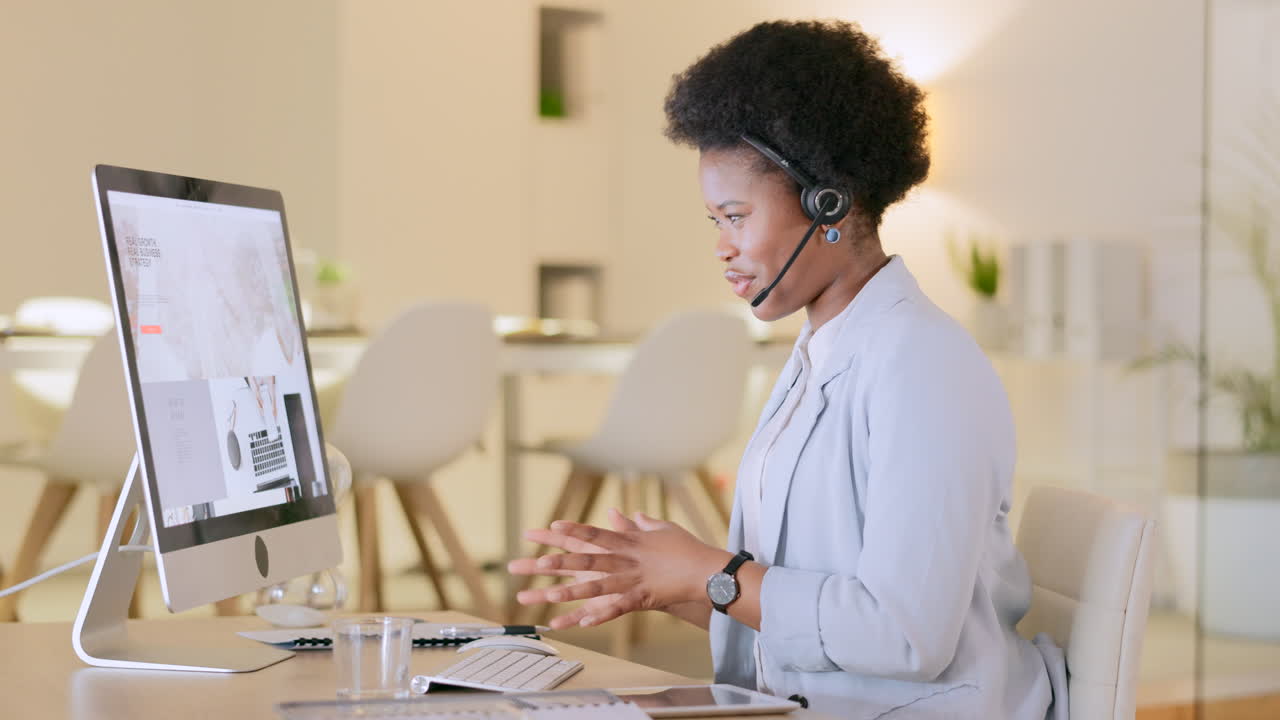 Call center agent talking to clients while wearing