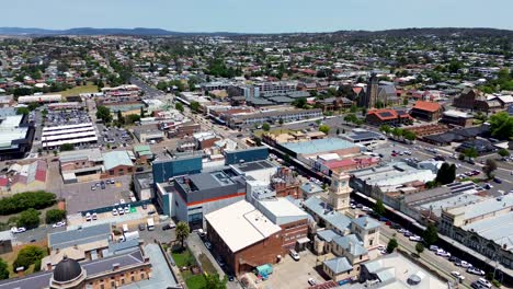 Drone-aerial-fly-over-landscape-town-scenery-shot-main-street-city-rural-suburb-church-streets-roads-buildings-town-Goulburn-Canberra-Sydney-Hume-NSW-Australia-4K