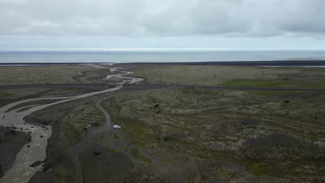 driving around iceland through the south coast, next to the ocean