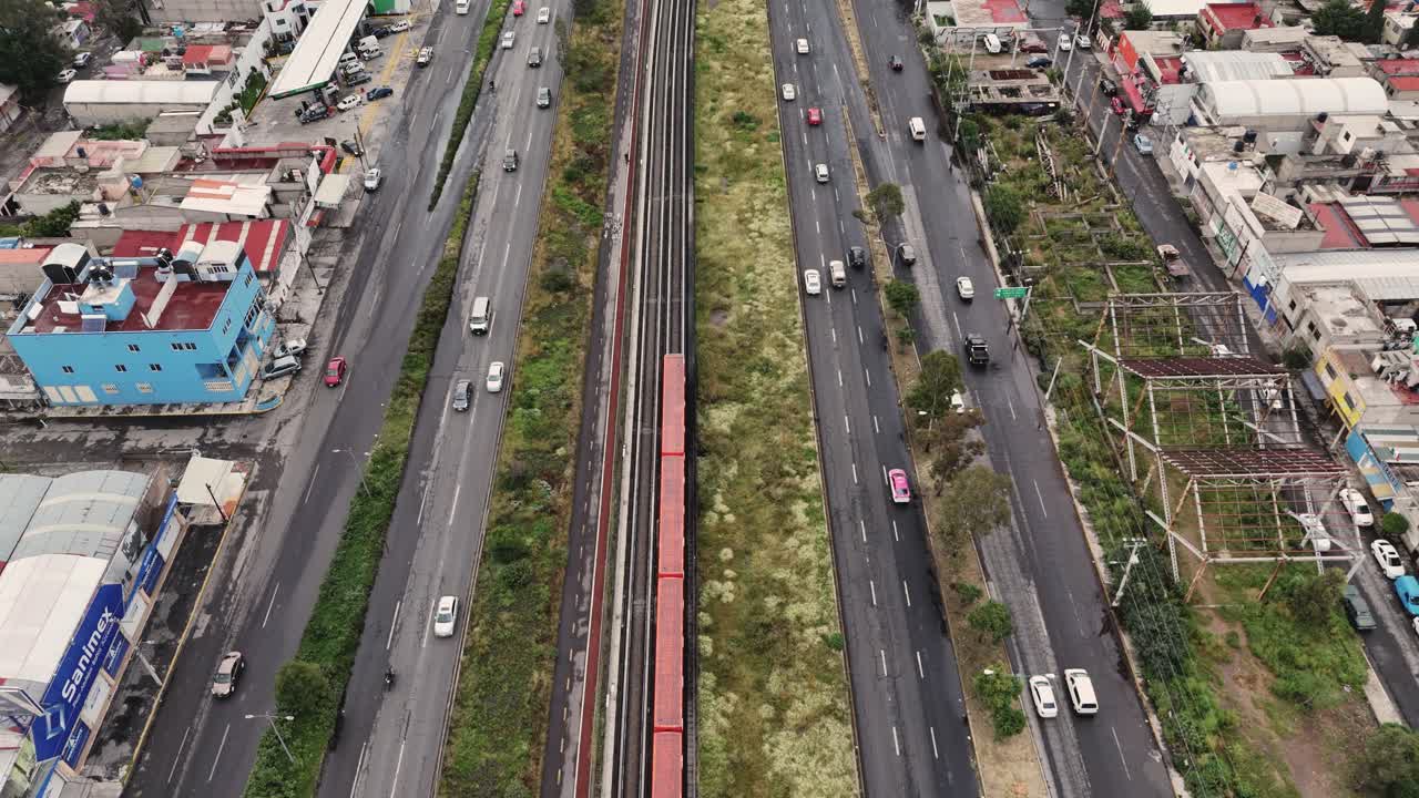 Slow-Motion View of the Metro Traversing Ecatepec Avenue