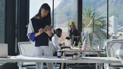 young woman using tablet computer