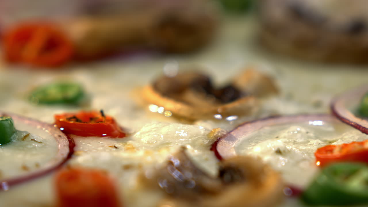 Close-up of a mushroom and pepper pizza