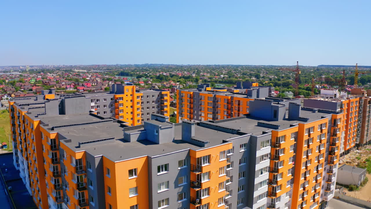 Big new city houses aerial view. High modern construction architecture.