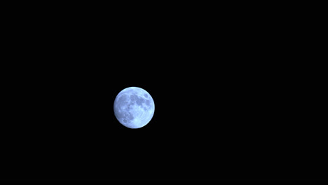 Full-Moon-Glowing-Bright-In-The-Night-Sky,-Astro-Time-Lapse