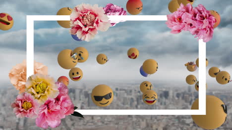 animation of flowers with white frame and flying emojis against cityscape with cloudy sky