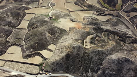 aerial view of terraced hillsides and agricultural fields