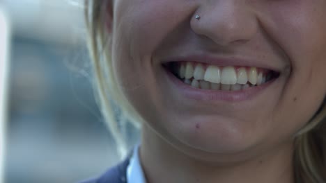 laughing young business woman. close-up of lips