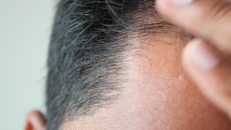 close up of a man's head and hair