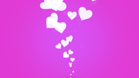 Hearts-of-love-cascading-from-the-sky-on-pink-background