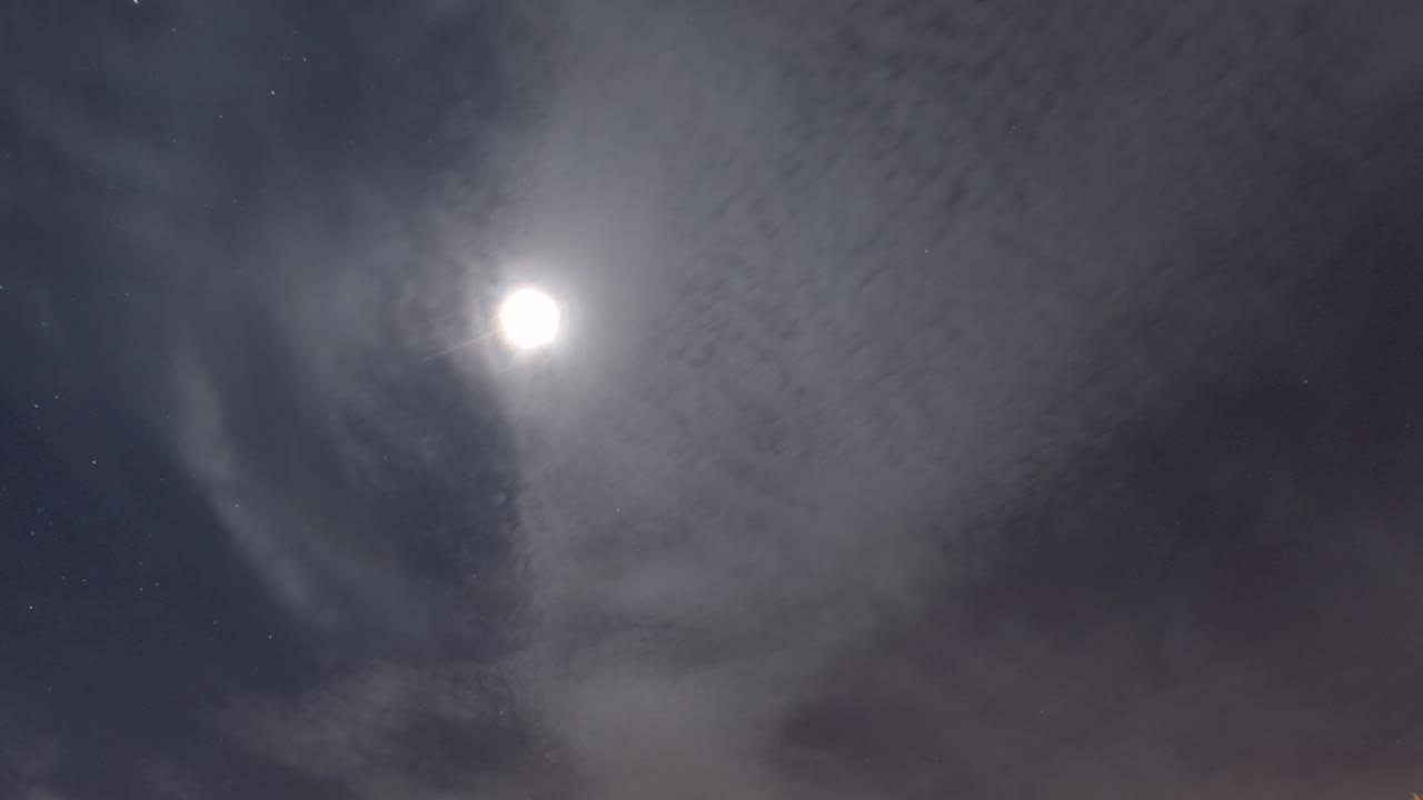 Bright moon light ray n lens flare effect in starry star night sky