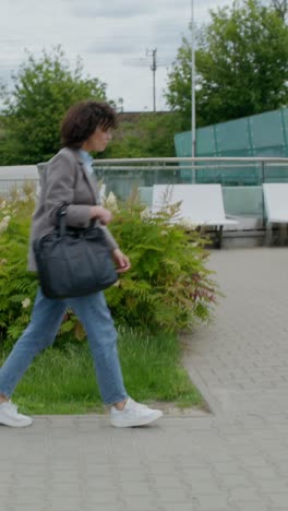 woman walking on a city street