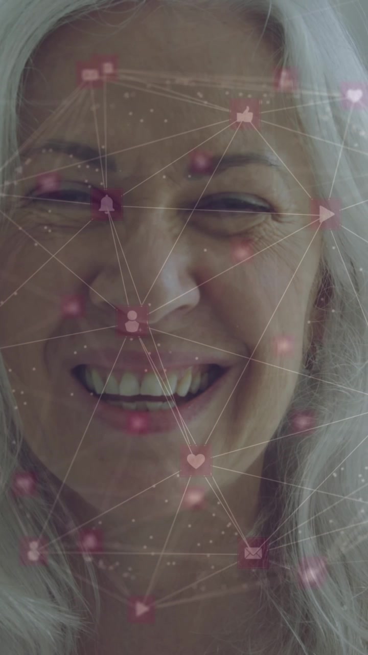 Animation of data processing over senior caucasian woman smiling