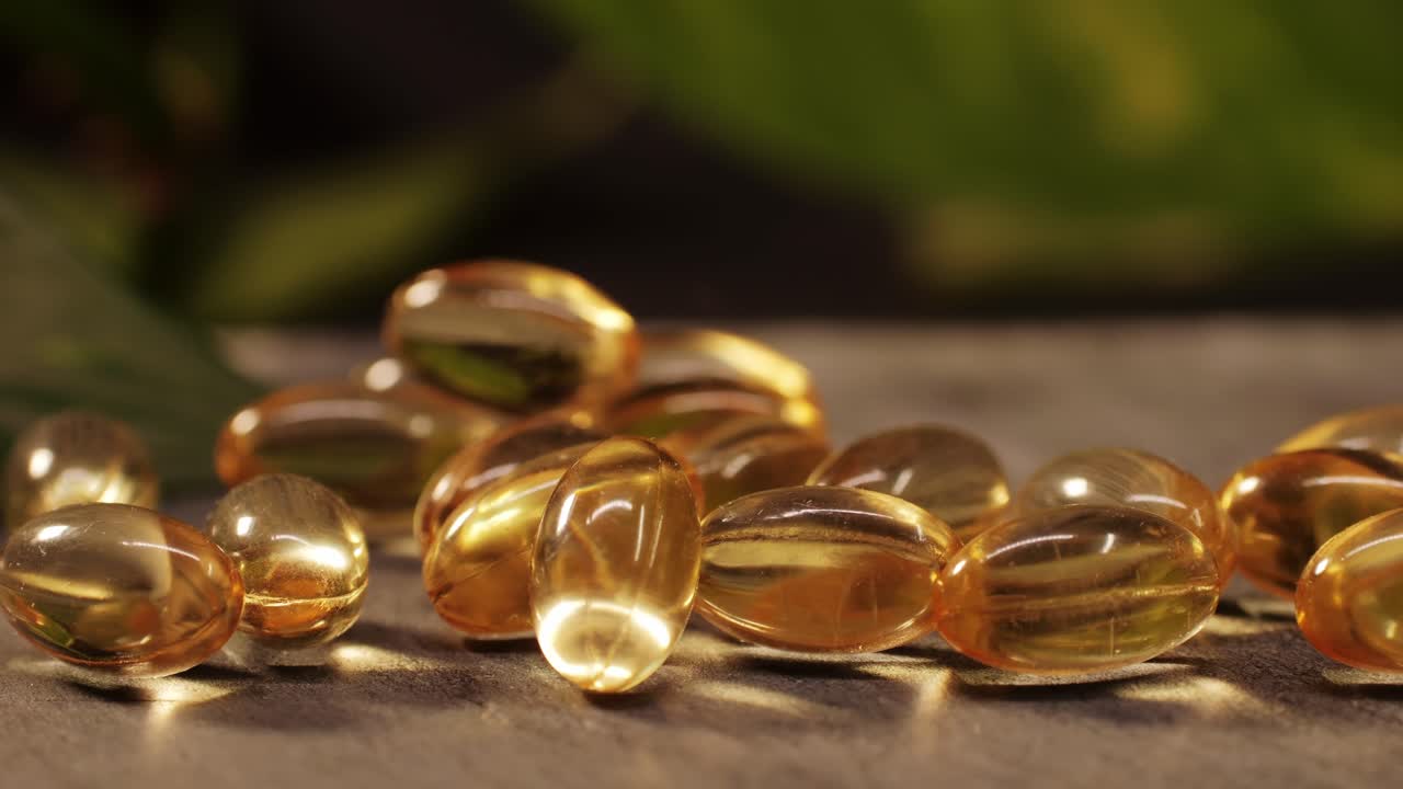 Omega fish oil gel capsules close-up . Omega vitamins pills 3 6 9. To be healthy and take care of your health. Pharmaceutical industry. Business of biological supplements and vitamin. High quality 4k footage