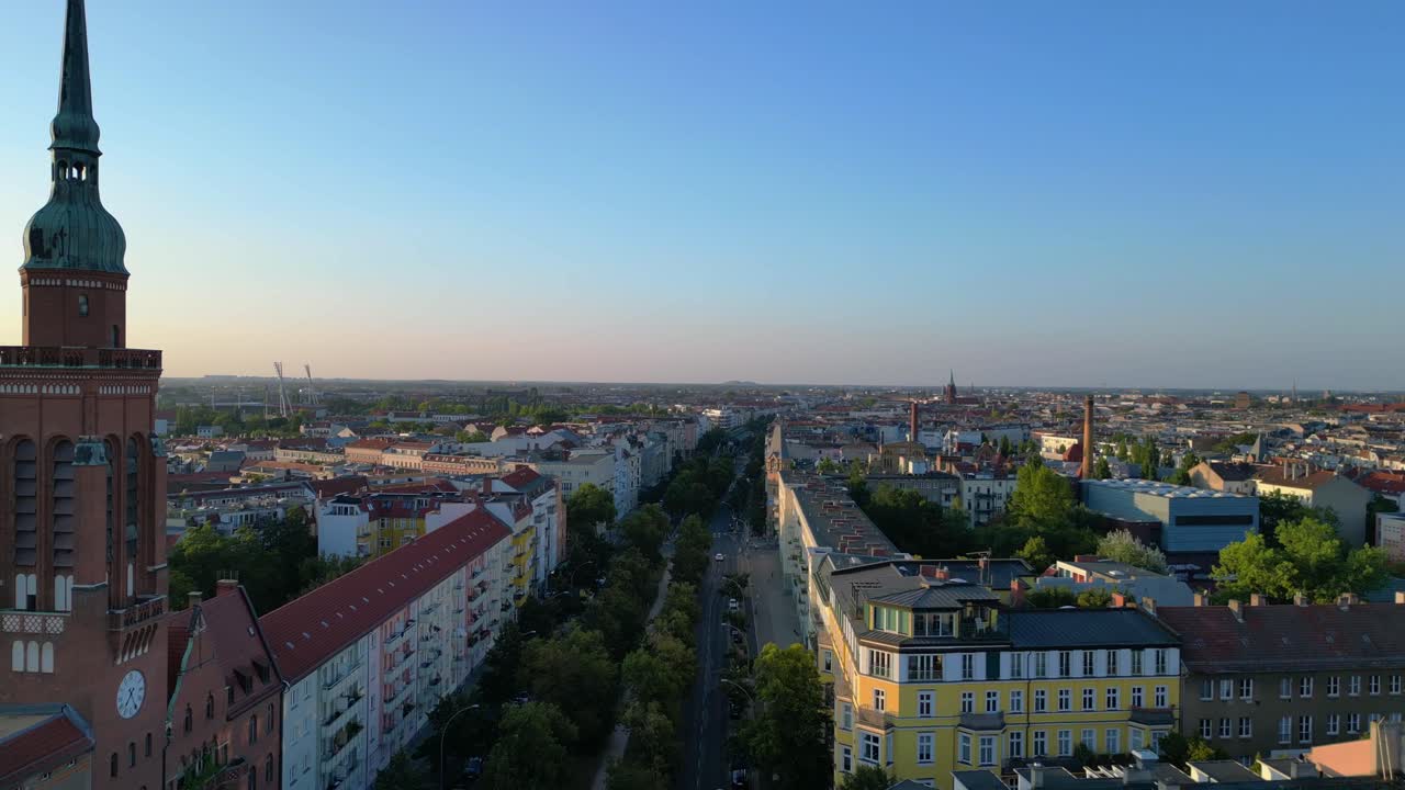 Serene jewish cemetery nestled within the bustling city of berlin, showcasing a tranquil oasis amidst the urban sprawl. Lovely aerial view flight fly reverse drone