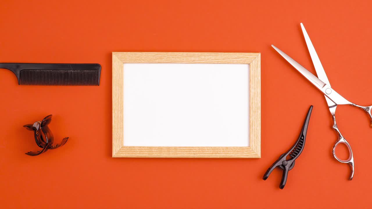 Stop motion animation mockup wooden frame of professional hair cutting shears, hairpins comb for separating hair and section hair clips template on orange background. Hairdresser salon equipment