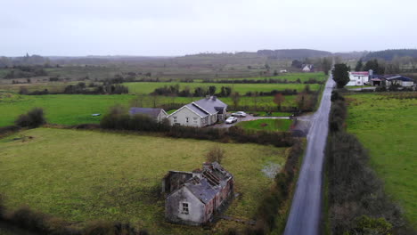 aerial - main road of a downtown nearby the river and the cafe on the roadside