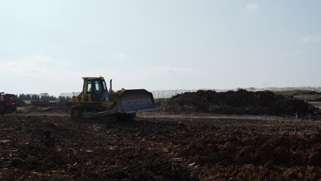 bulldozer on a dirt construction site