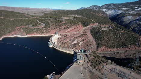 flaming gorge dam and hydroelectric power plant in utah near wyoming border, drone aerial view