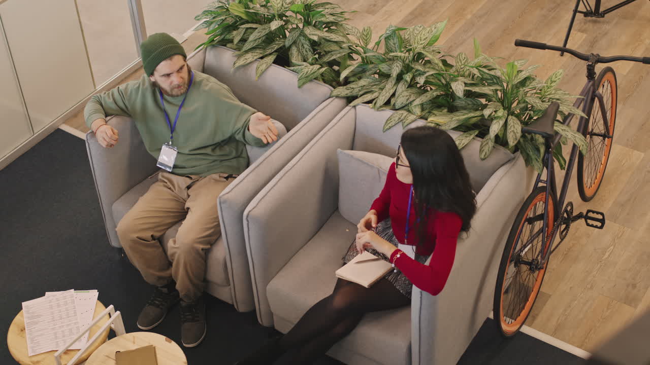 Top View of Young Businesspeople Chatting