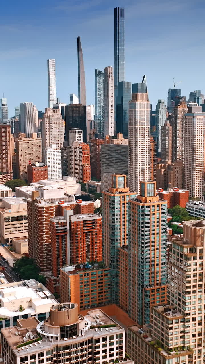 Striking and diverse skyscrapers of New York midtown. Beautiful architecture footage on sunny daytime. Vertical video