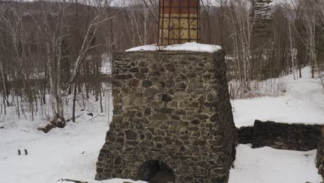 katahdin ironworks ascending up revealing peasant river in winter snowfall