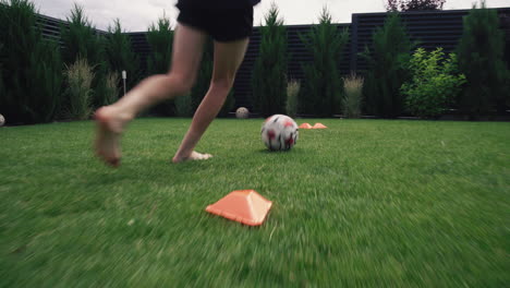 soccer training in backyard