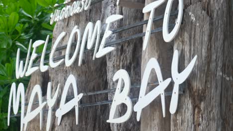 welcome to maya bay sign phi phi island at phuket thailand tilt shot