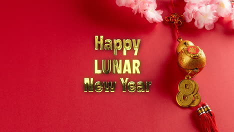 animation of happy lunar new year ext over chinese pattern on red background