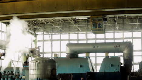 overhead crane in factory. overhead crane and hook inside factory building for lifting work
