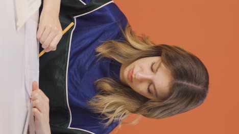 Vertical-video-of-The-young-woman-who-signed-the-paperwork.