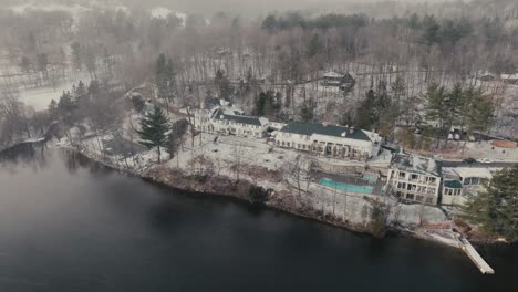 lakeside hotel of manoir hovey during winter in rue hovey, north hatley québec, canada